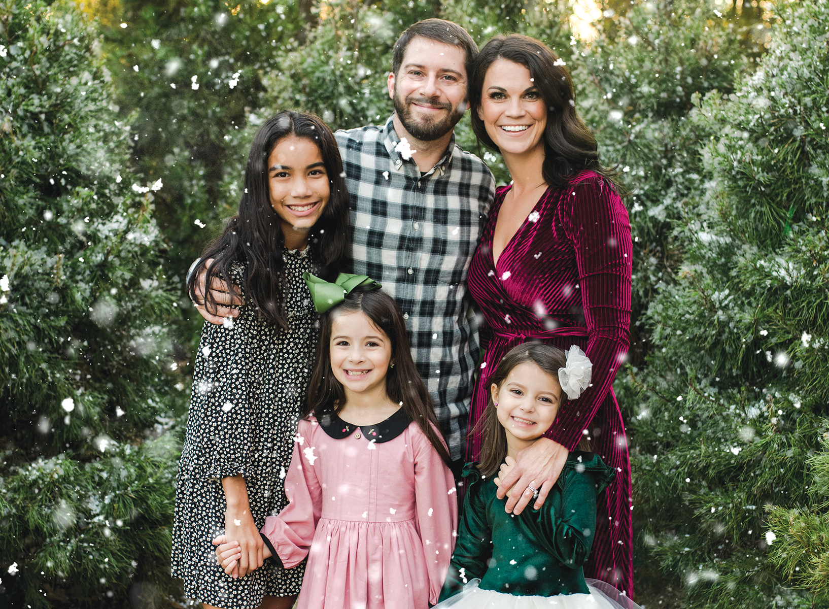 Birmingham photographers Lane and Josh Weichman posing with three daughters.