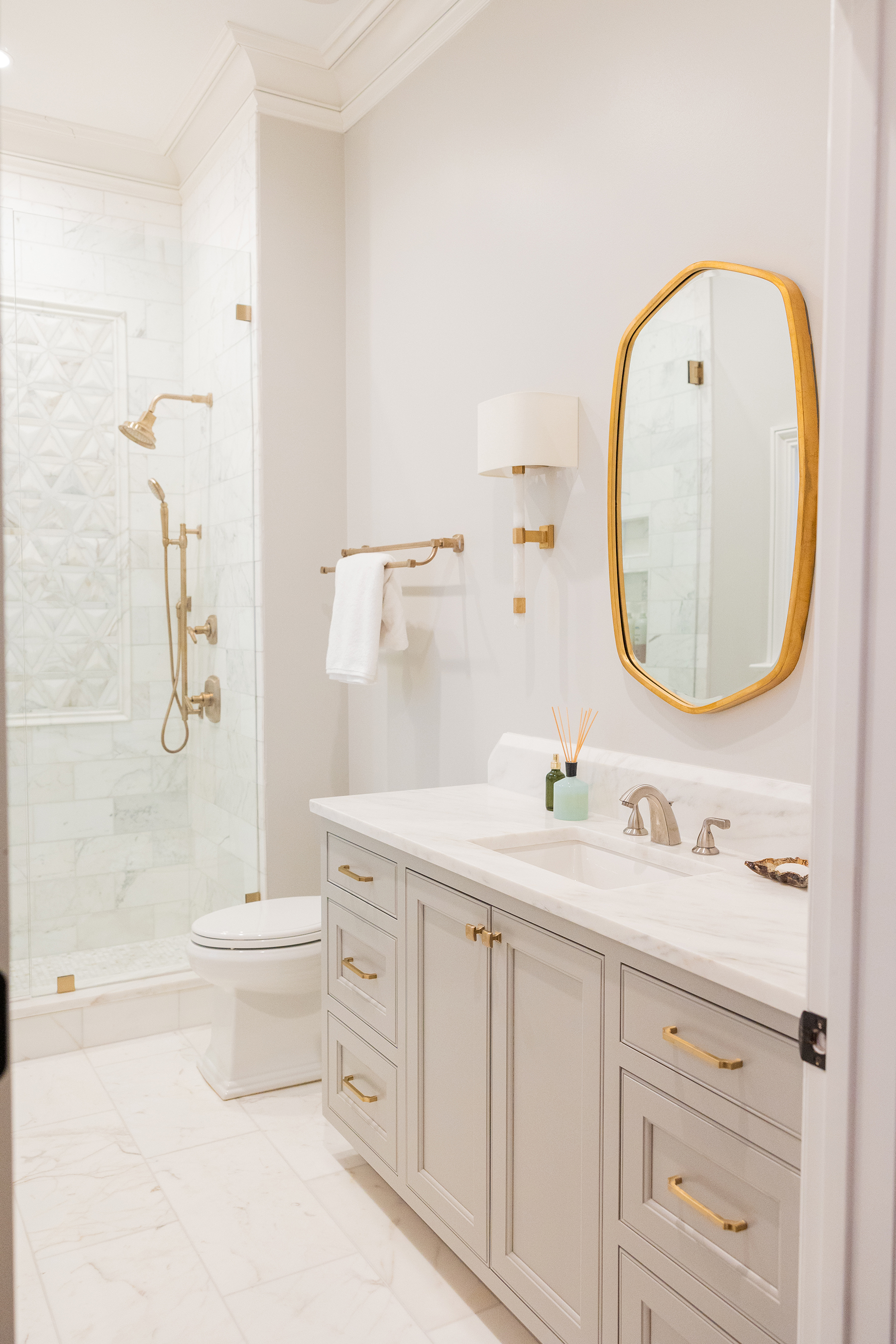 bathroom with gold accents