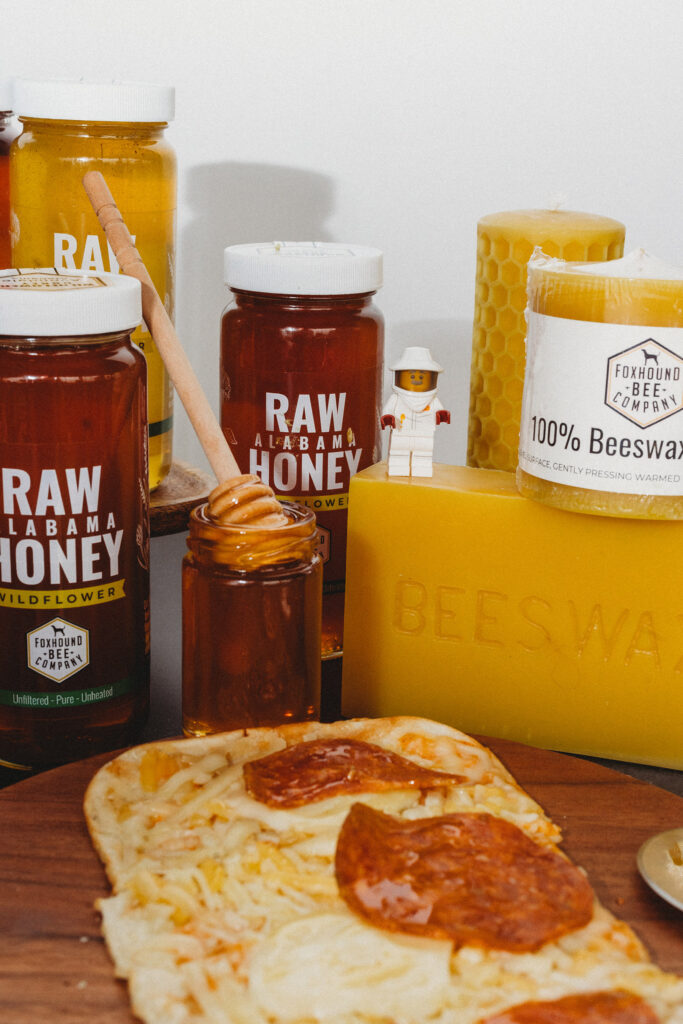 Honey and candles made from Fox Hound Bee Company products