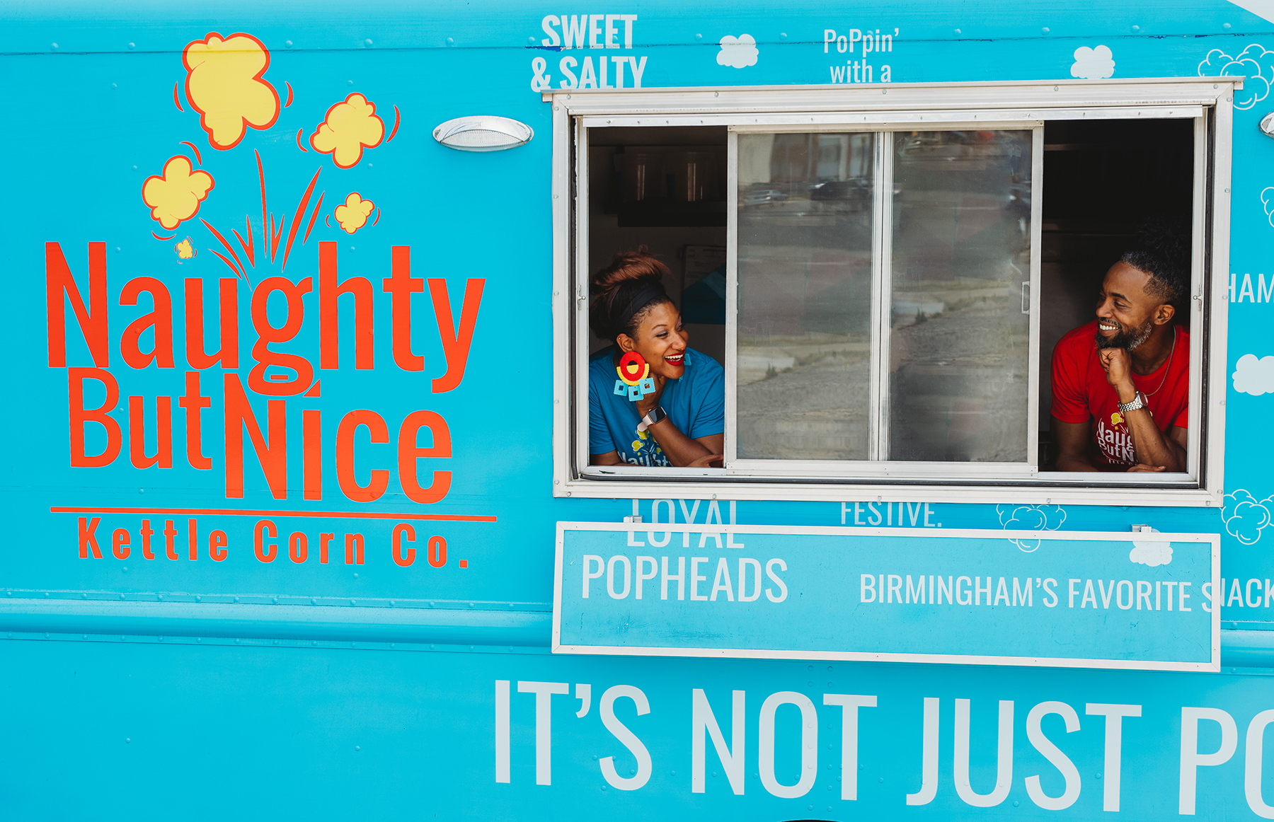 Tanesha and Clem Summers in the Naughty But Nice Kettle Corn Co. truck.
