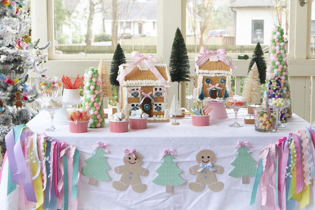 Gingerbread houses decorated at a Kid-Friendly Christmas party.