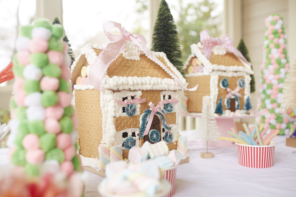 Gingerbread houses decorated at a Kid-Friendly Christmas party.