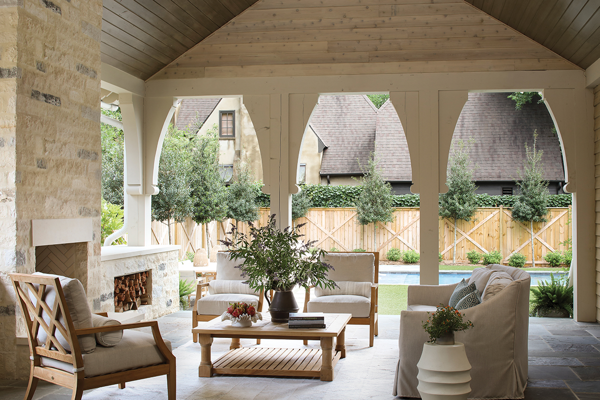 Covered patio and view of pool