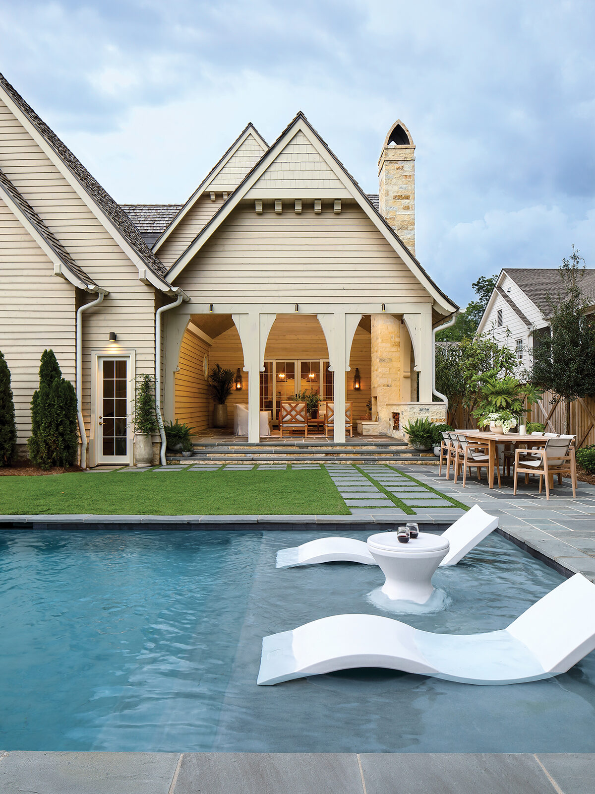 Rear view of Edgewood house with pool